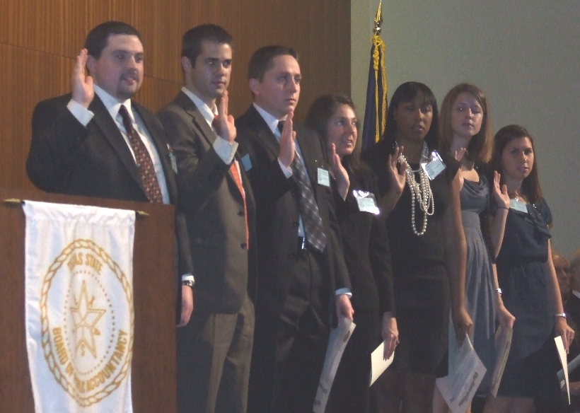 Candidates Completing the Oath of Office